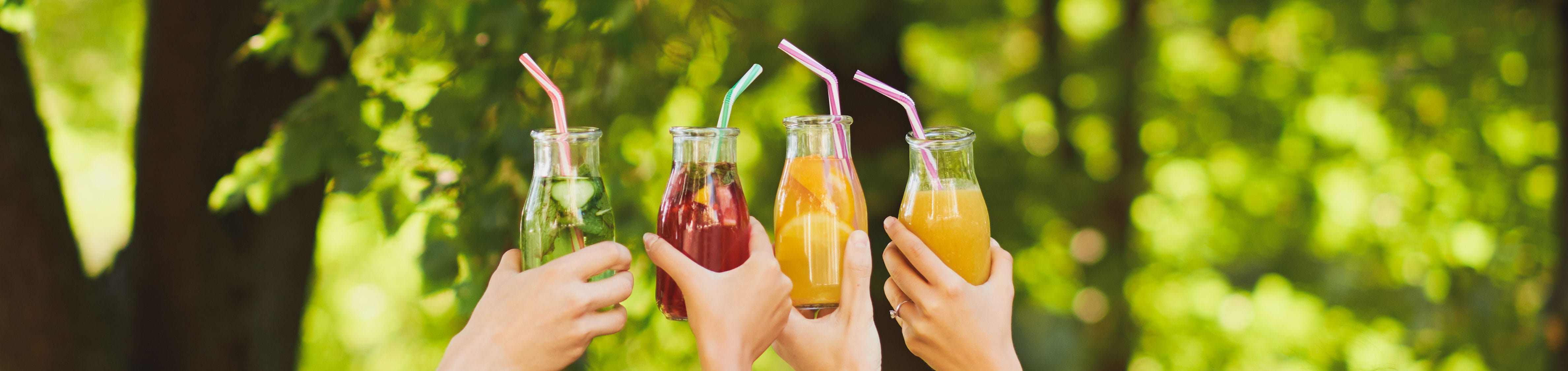 Group Of People Celebrate With Juice