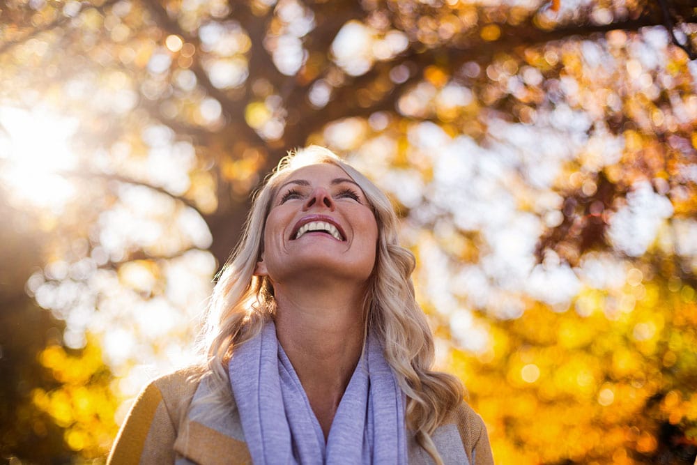 Smiling Woman looking Up